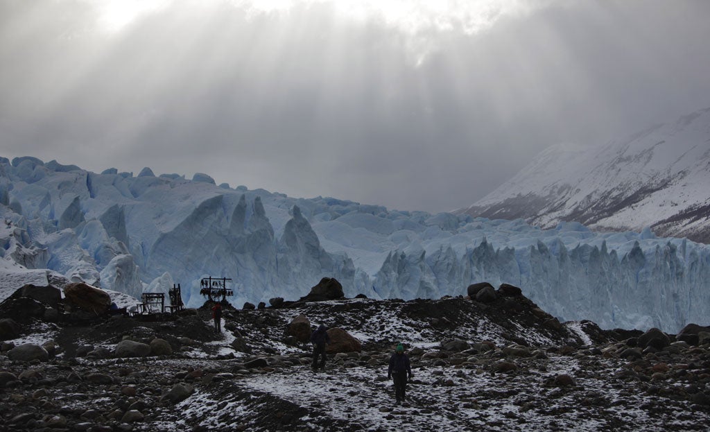 Tip of the iceberg: Hikers pass Patagonia's Morena Glacier