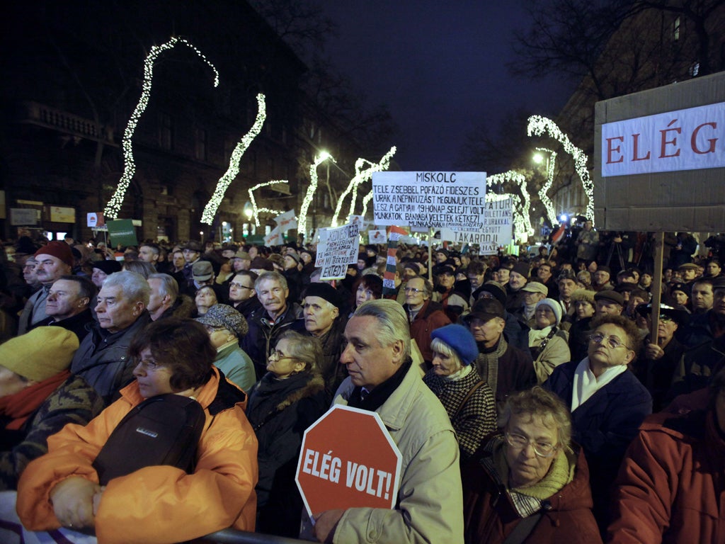 Protesters gather on Monday in Budapest near the state opera house