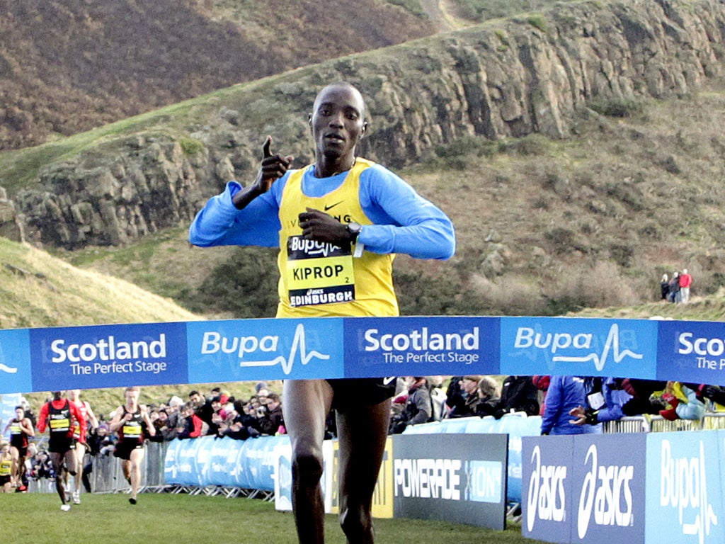 Kenya's Asbel Kiprop crosses the finish line to win the Great Edinburgh Cross Country Challenge 3km race at Holyrood yesterday