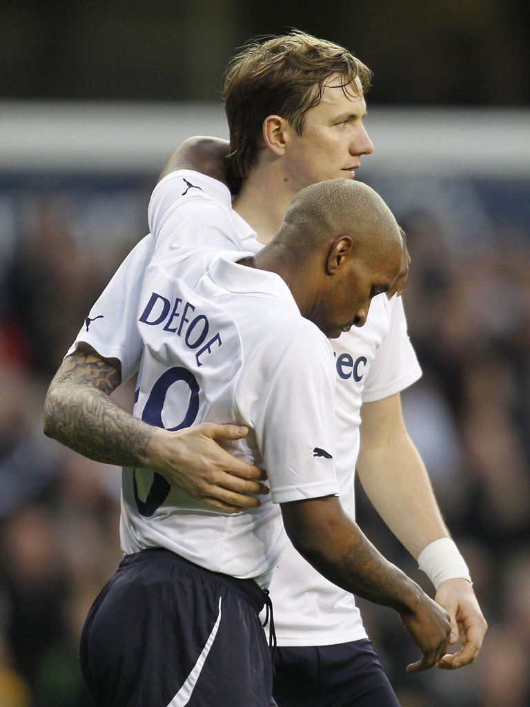 Roman Pavlyuchenko celebrates his goal with Jermain Defoe