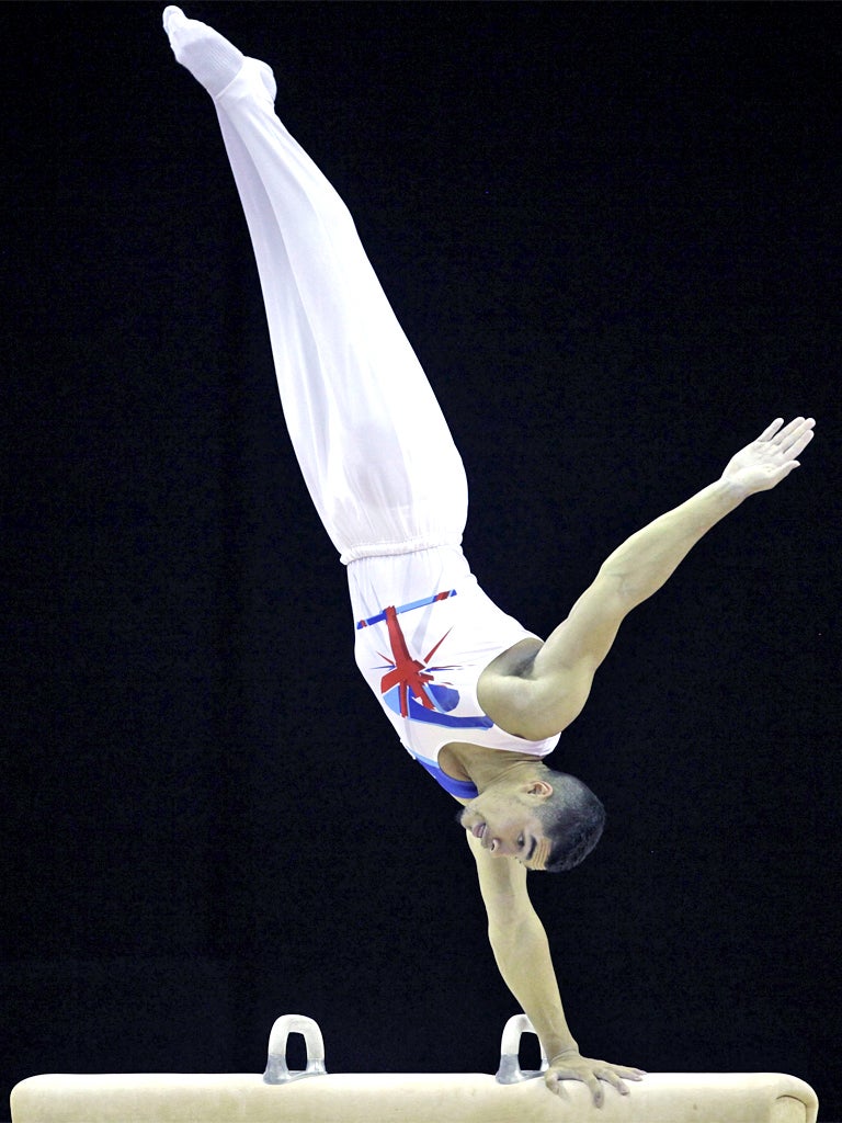 Great Britain's Louis Smith excels on the pommel horse in the Olympic qualification event at North Greenwich Arena in London last night