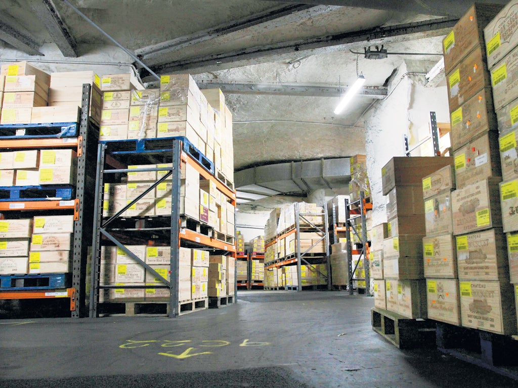 A lot of bottle: Cases of wine are stored 100ft below ground level at Corsham Cellars near Chippenham
