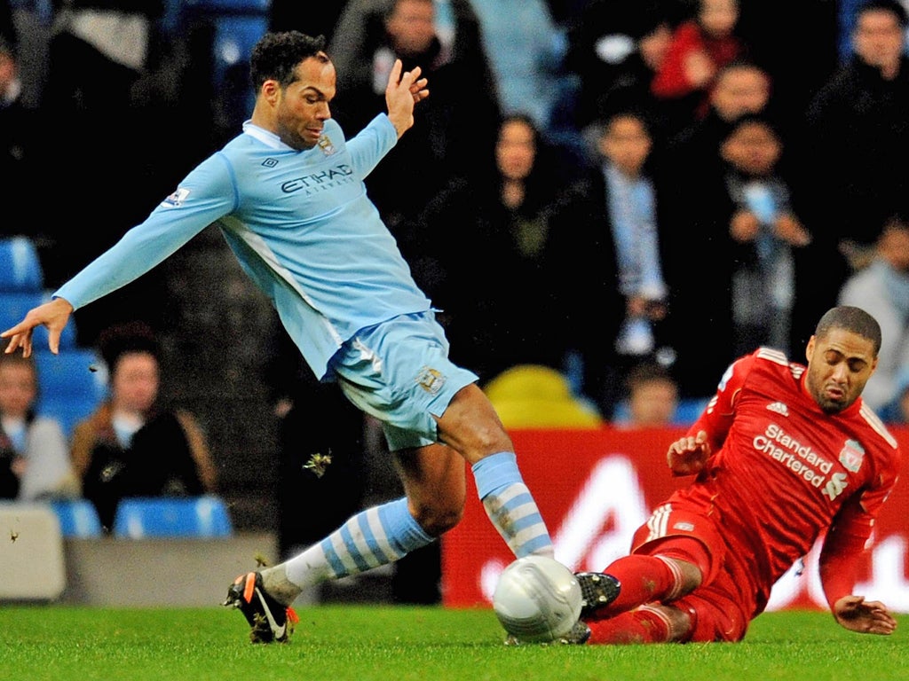 Glen Johnson lunges in on Joleon Lescott with 'excessive force'
- and should have been sent off