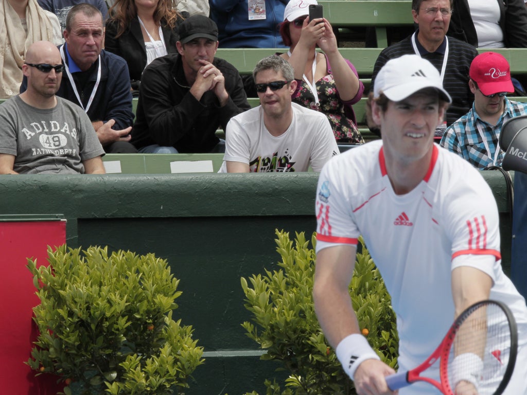 Ivan Lendl (second from left) watched Andy Murray in action yesterday