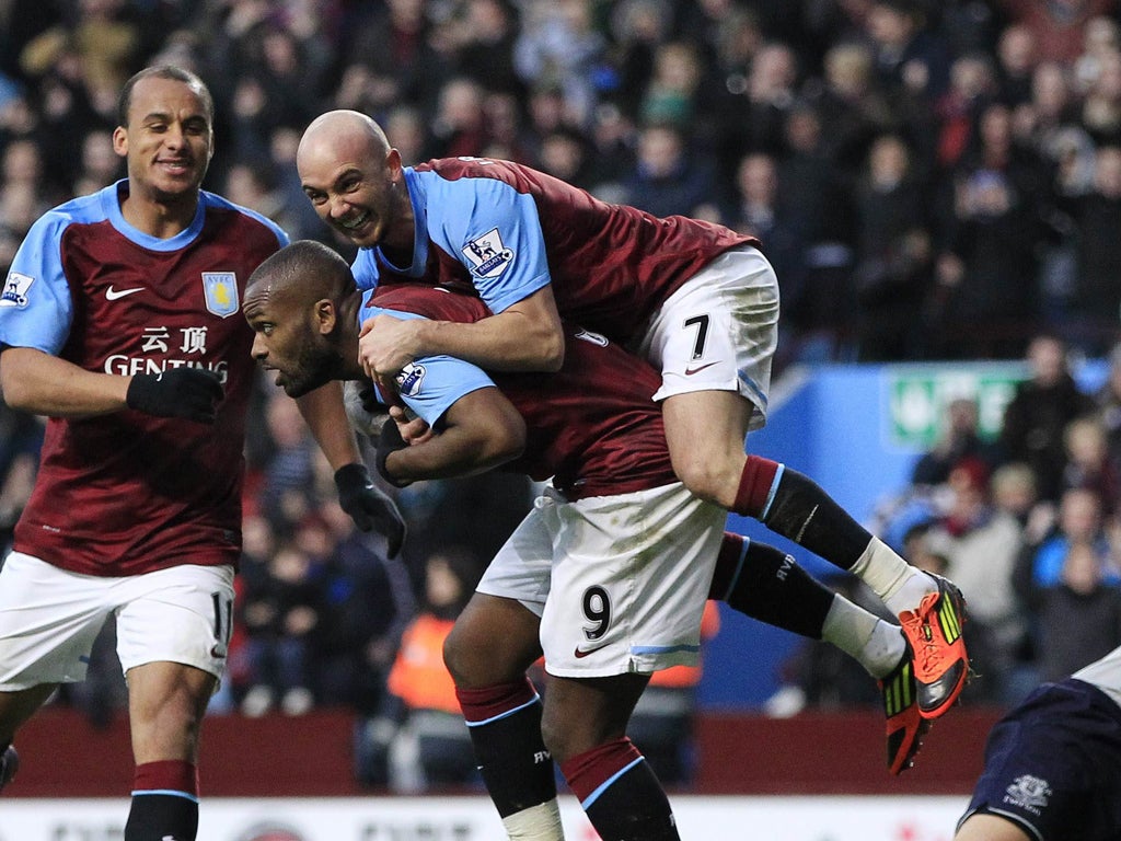 Stephen Ireland hitches a lift after Darren Bent's goal