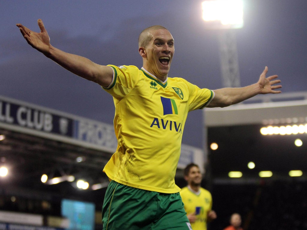 Steve Morison celebrates scoring Norwich's winner