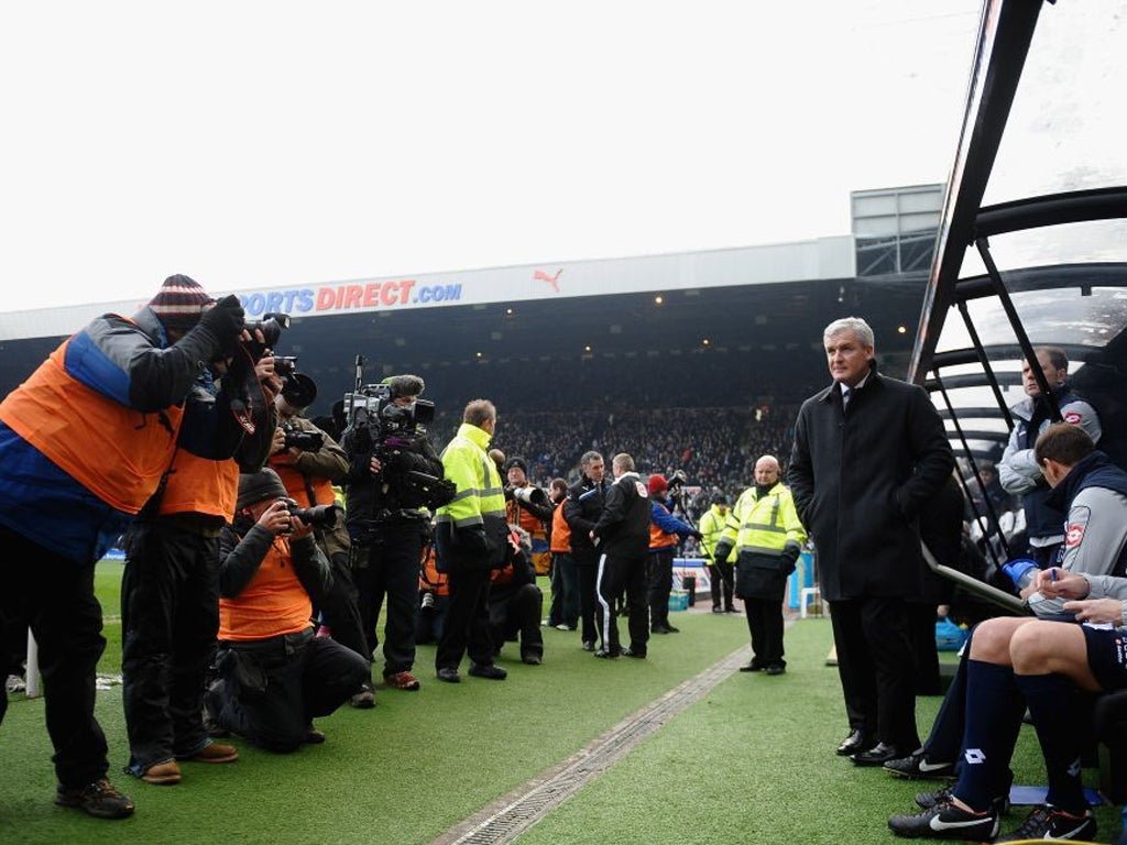 Mark Hughes takes to the bench for his first game as manager of Queen's Park Rangers