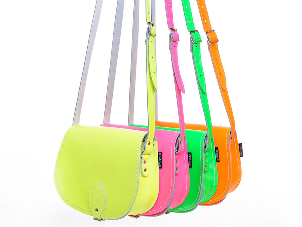 We Love: The new satchel - The geek-chic favourite has been knocked off its pedestal by something much more at home with the horsey set. Saddle bags are set to be everywhere this summer, so stand out from the crowd with a neon number. £55, zatchels.com