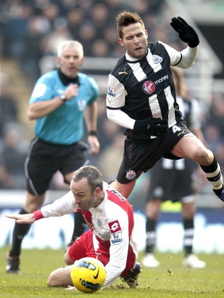 Shaun Derry's challenge ends Yohan Cabaye's afternoon under the eye of referee Chris Foy