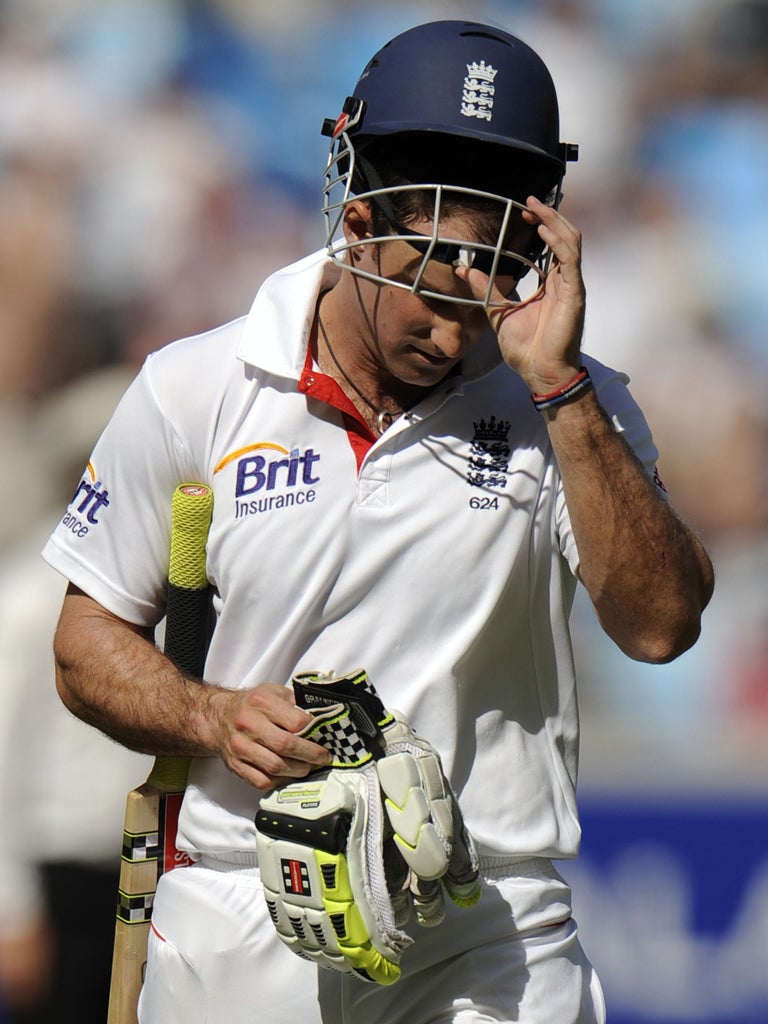 England captain Andrew Strauss trudges from the field in Dubai yesterday after being given out in controversial fashion by the third umpire