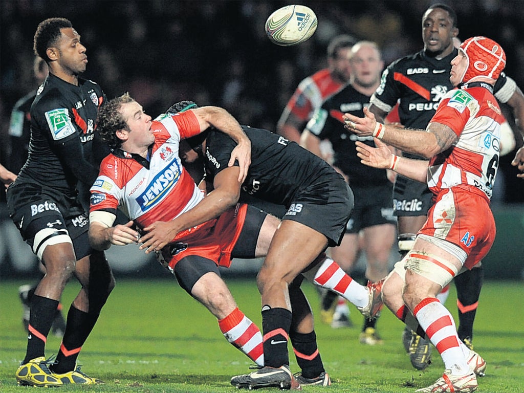 Gloucester’s James Simpson-Daniel (left) releases the ball to Luke Narraway