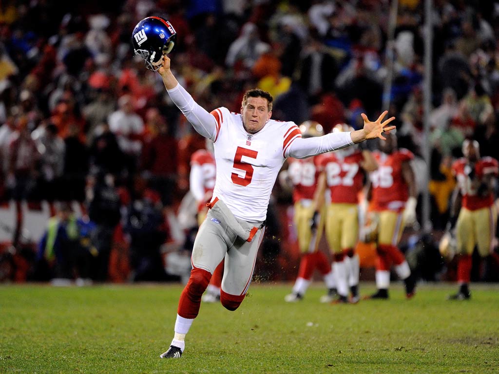 Steve Weatherford of the New York Giants celebrates after the Giants won 20-17 in overtime against the San Francisco 49ers