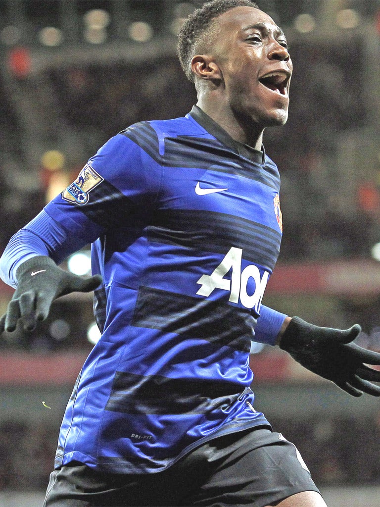 Welbeck celebrates his winner at The Emirates