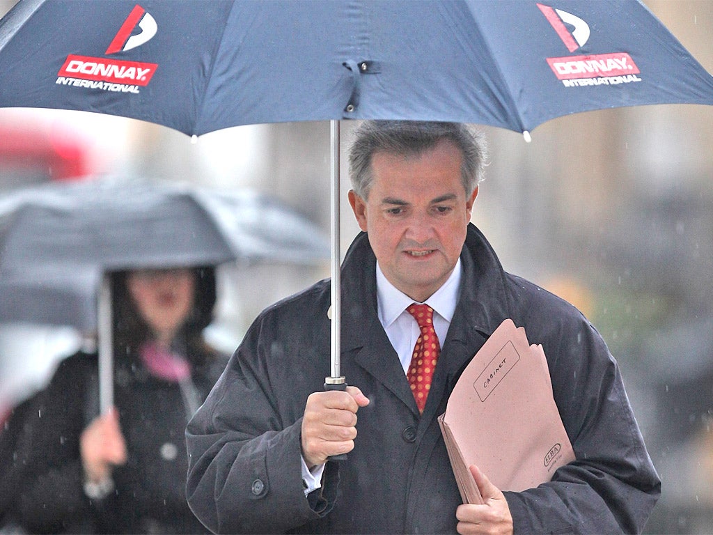 Chris Huhne is waiting to hear if he will be charged over speeding allegations