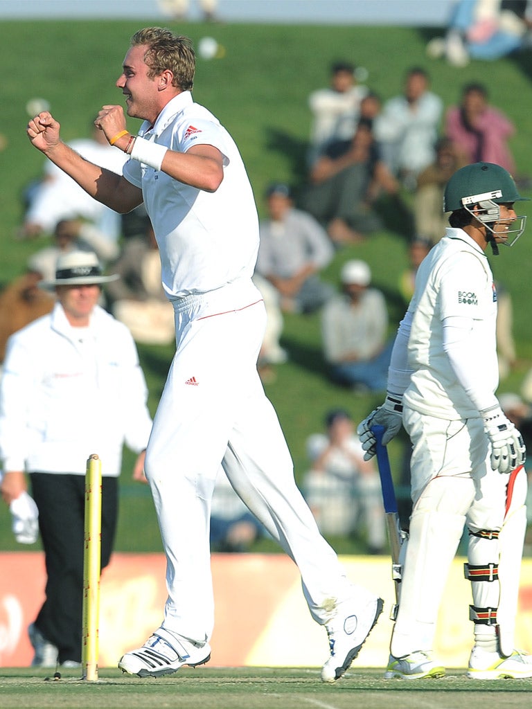 The pick of England's bowlers, Stuart Broad, celebrates after trapping Adnan Akmal lbw