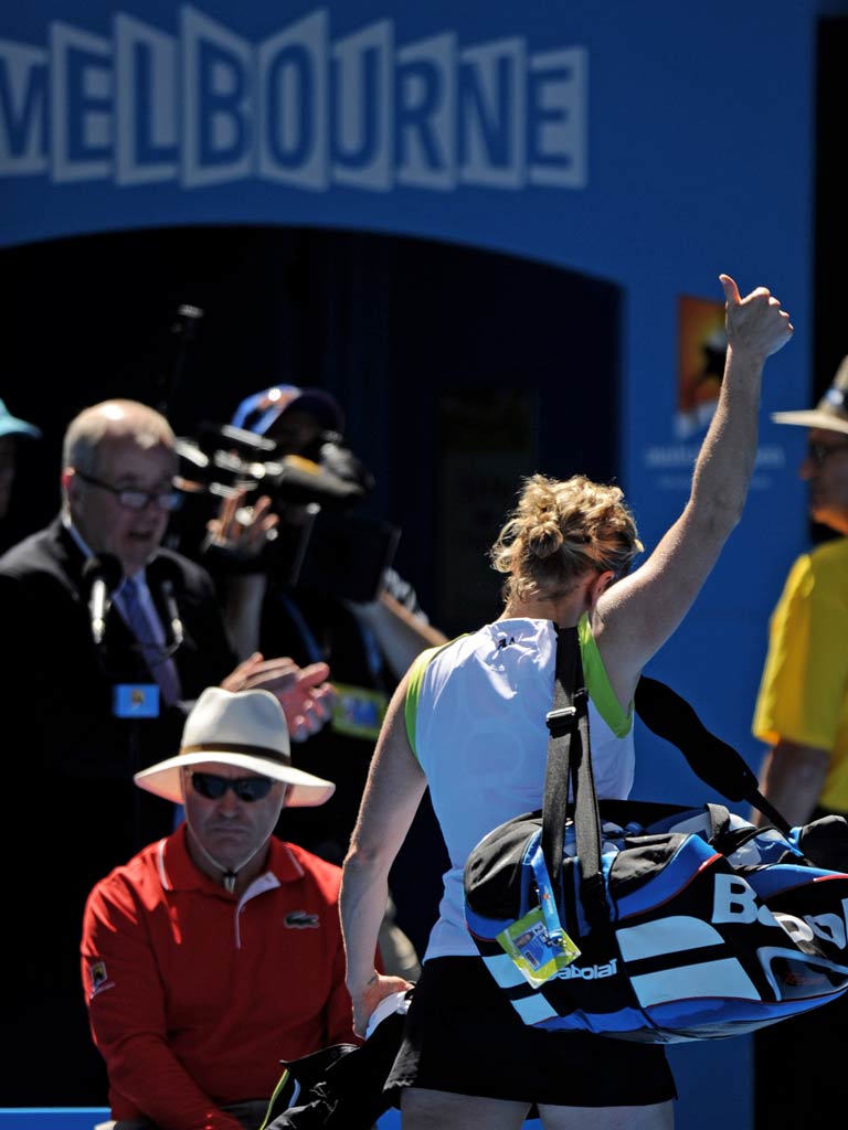 Kim Clijsters departs the Rod Laver Arena