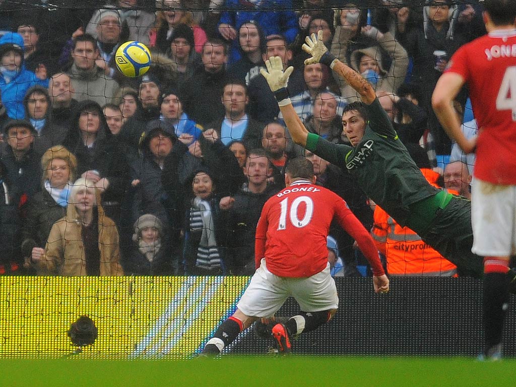 Wayne Rooney scored twice against City to help United advance in the FA Cup