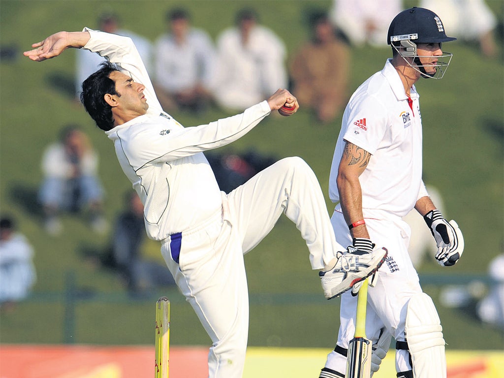 Kevin Pietersen looks on as Saeed Ajmal weaves his
magic