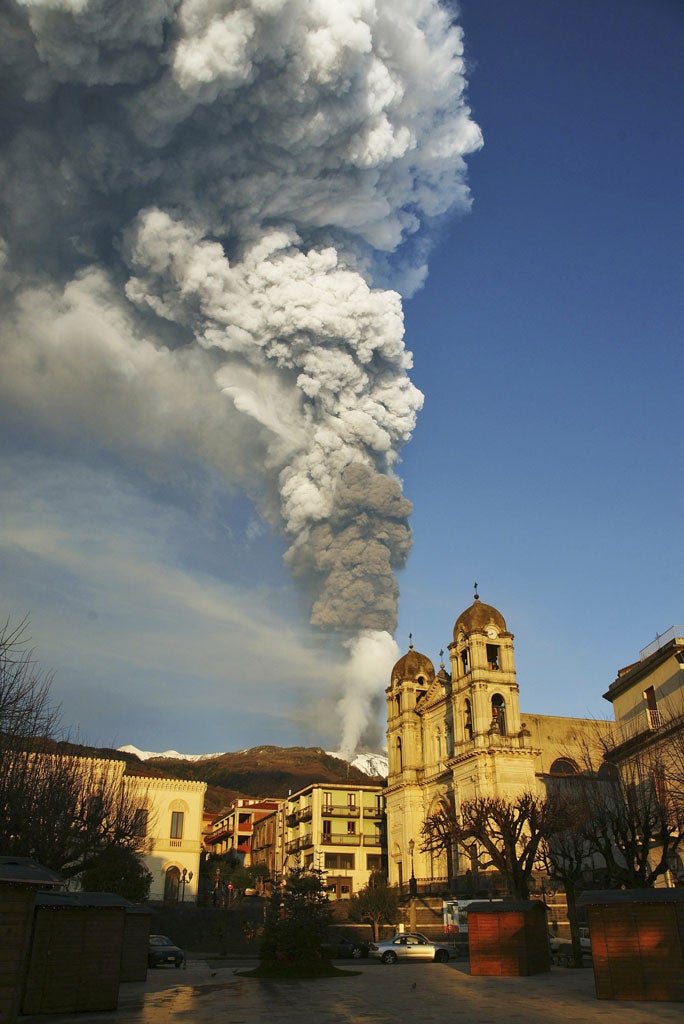 Big smoke: Mount Etna rumbles in the distance