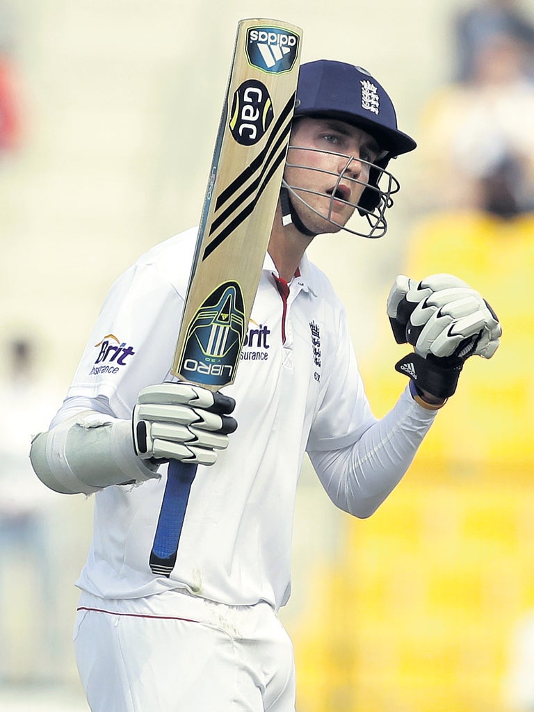 Stuart Broad celebrates his half-century in Abu Dhabi yesterday