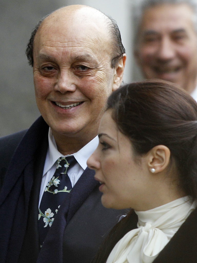 Asil Nadir with his wife Nur at the Old Bailey, where his trial continues