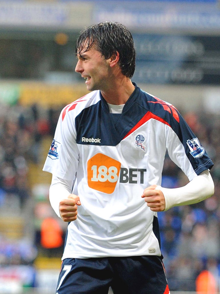 Chris Eagles celebrates after scoring for Bolton against Swansea