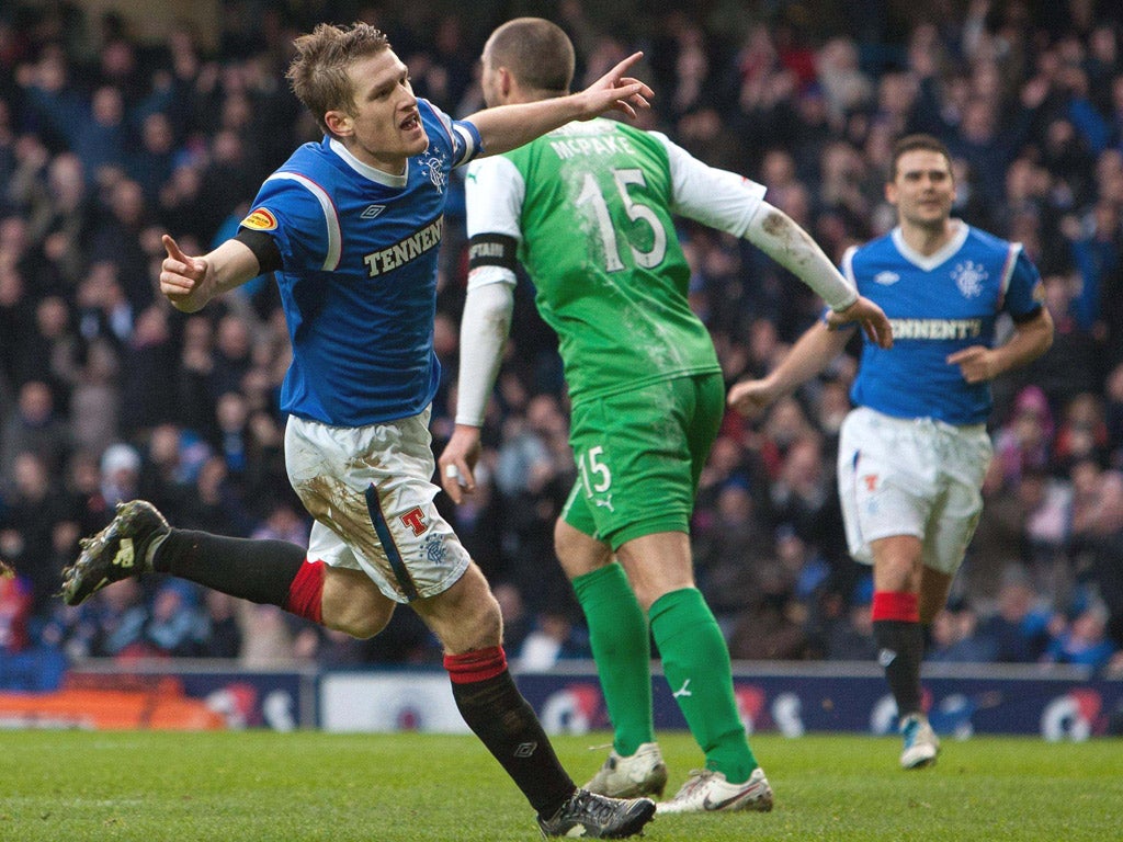 Rangers captain Steven Davis celebrates scoring against Hibernian