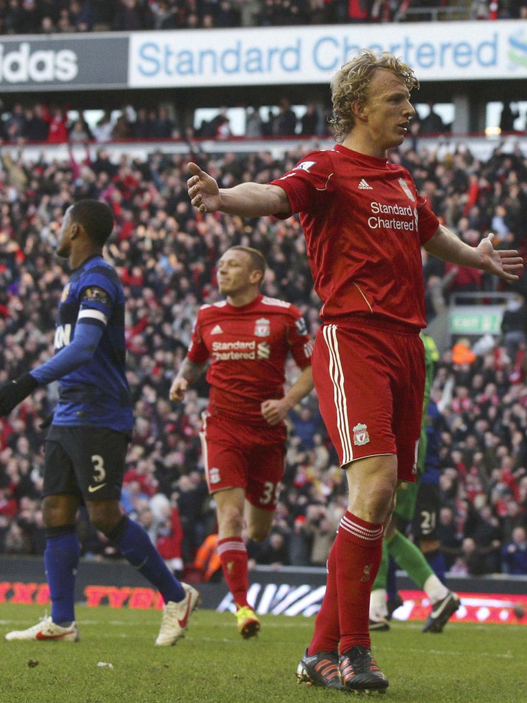 Dirk Kuyt celebrates after scoring a late winner for Liverpool to end Manchester United’s involvement in the FA Cup