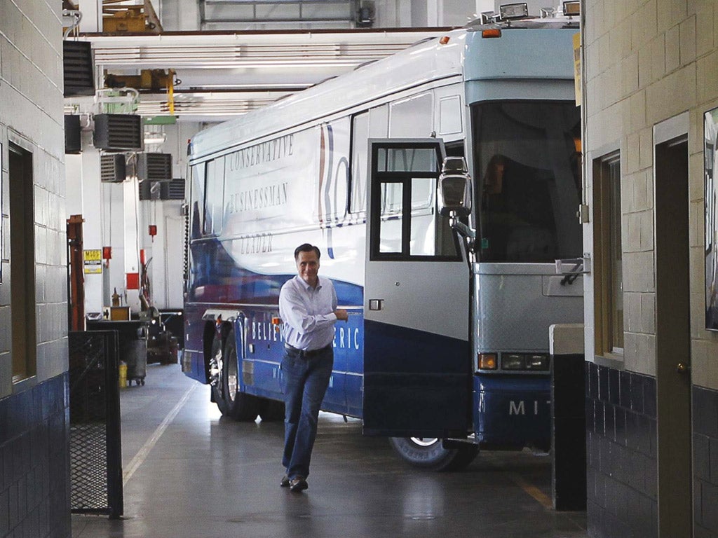 Mitt Romney arrives for a campaign stop at Ring Power Lift Trucks in Jacksonville