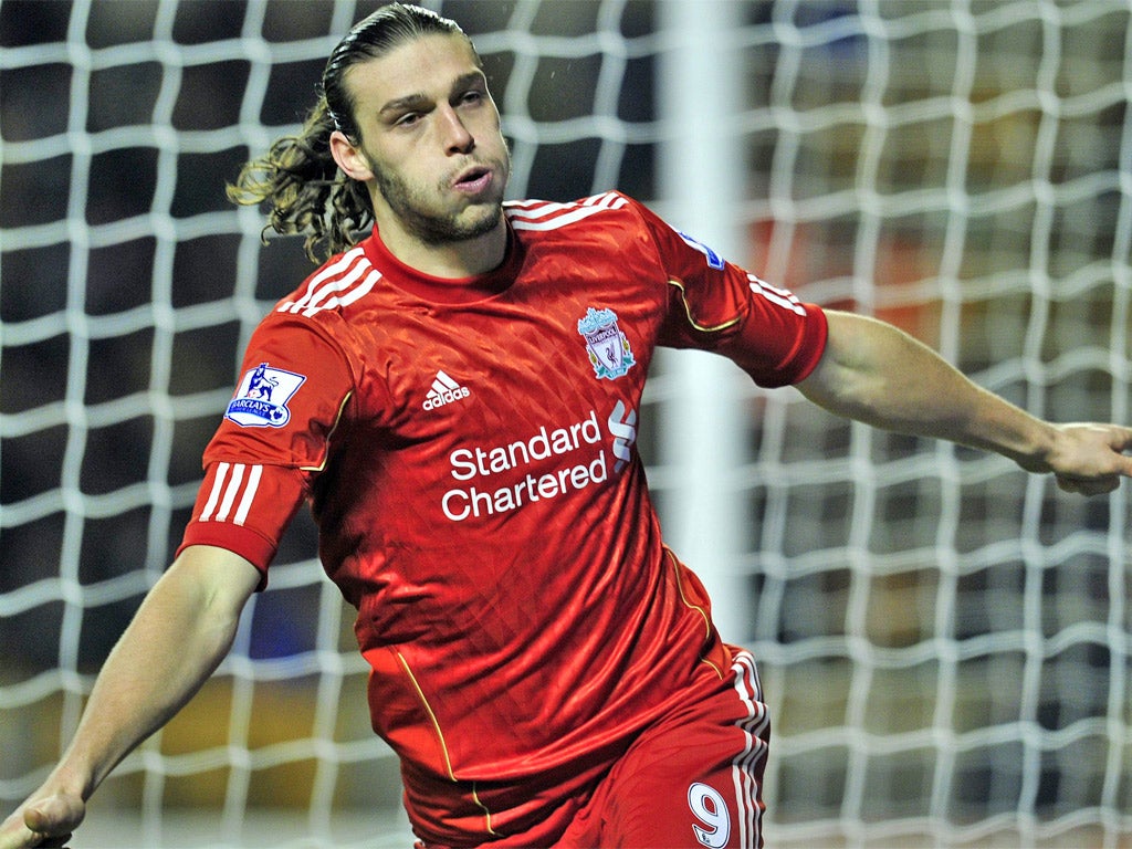 Andy Carroll wheels away after putting Liverpool on their way to a win at Wolves