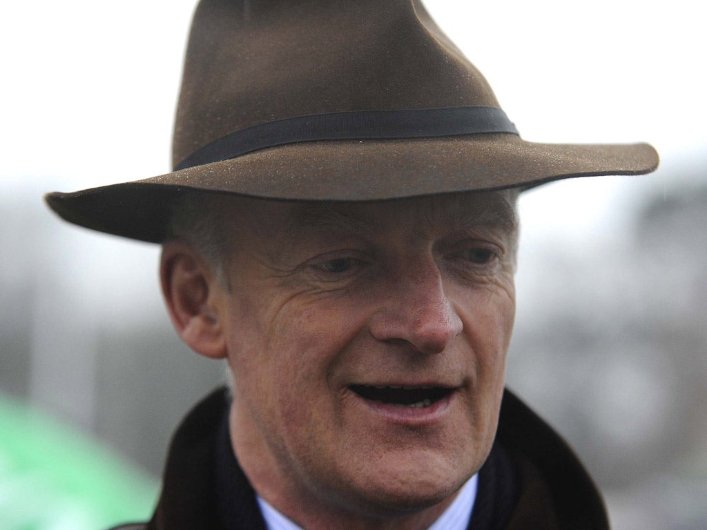 WILLIE MULLINS: Irish trainer has entered 12
horses for the Aintree marathon on 14 April