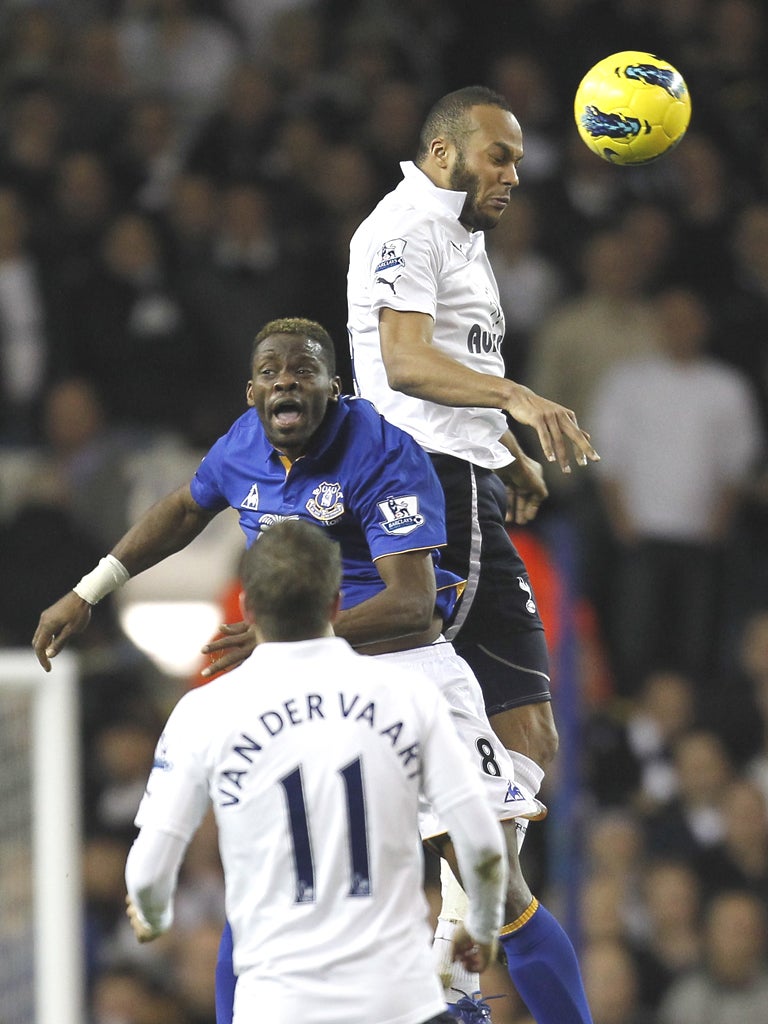 Younes Kaboul beats Louis Saha to a header in the league game last month – now they are team-mates