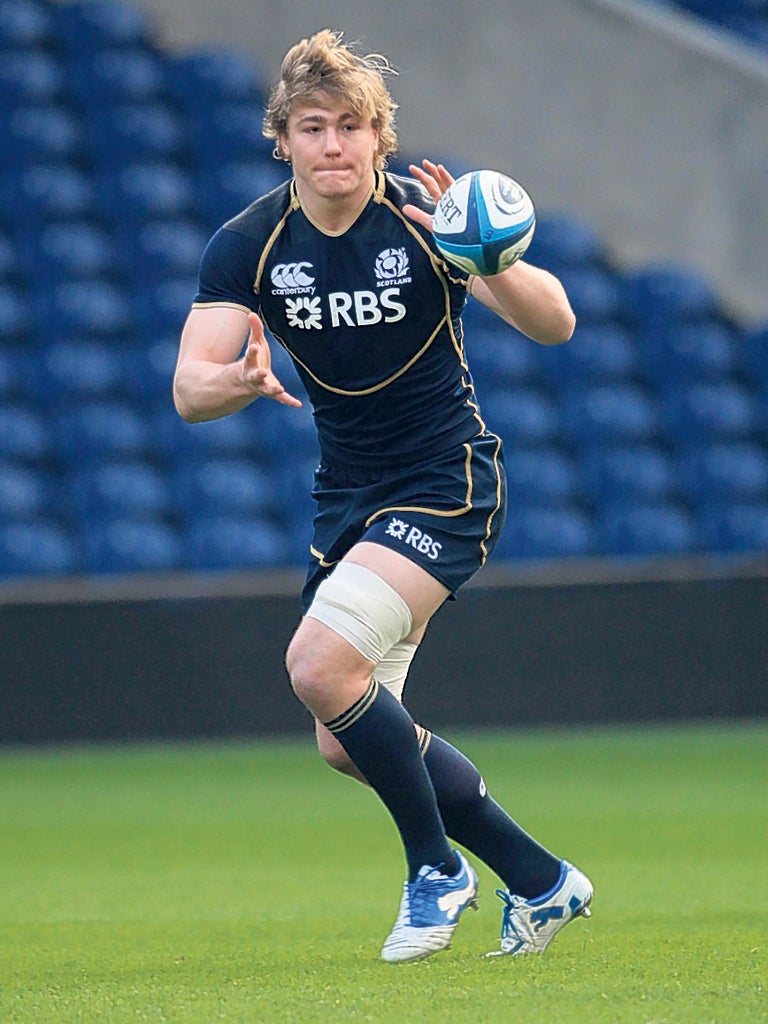 The No 8 David Denton keeps his eye on the ball in training