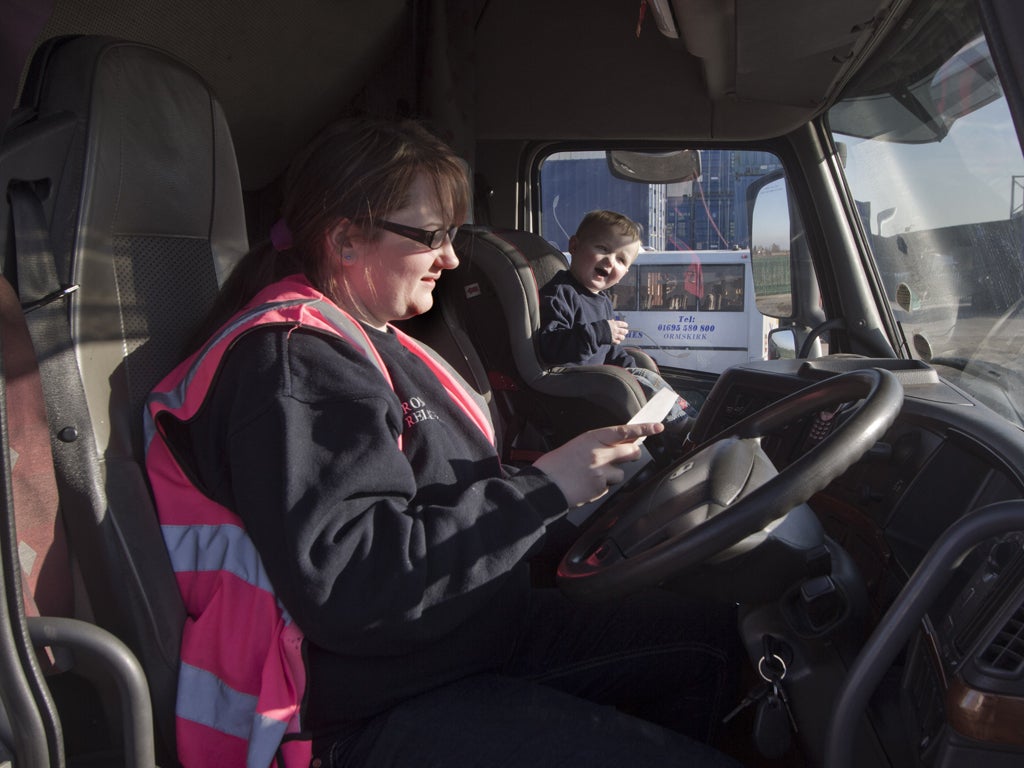 Lyndsey Graham with her two-year-old son Dylan in the cab. She plans to take him to work until he starts school