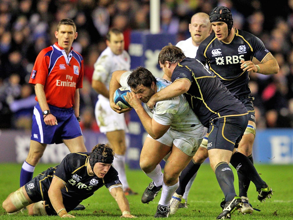 Prop up: Alex Corbisiero holds off Scotland’s Allan Jacobsen