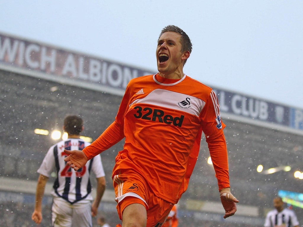 Ice breaker: On-loan Gylfi Sigurdsson celebrates scoring Swansea’s first goal