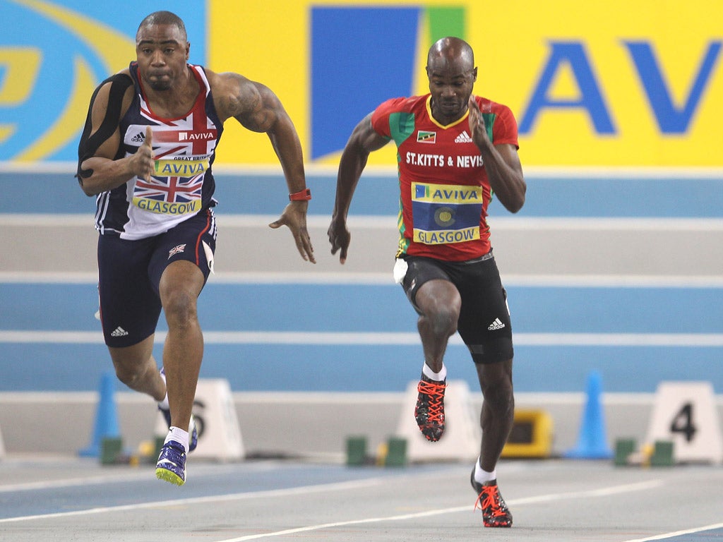 'I can’t deal with the cold, and in St Kitts I have good weather all year round,' says Kim Collins (right)