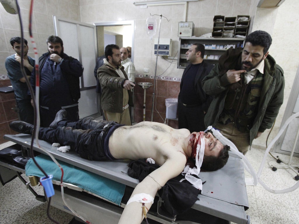 An injured protester in Idlib