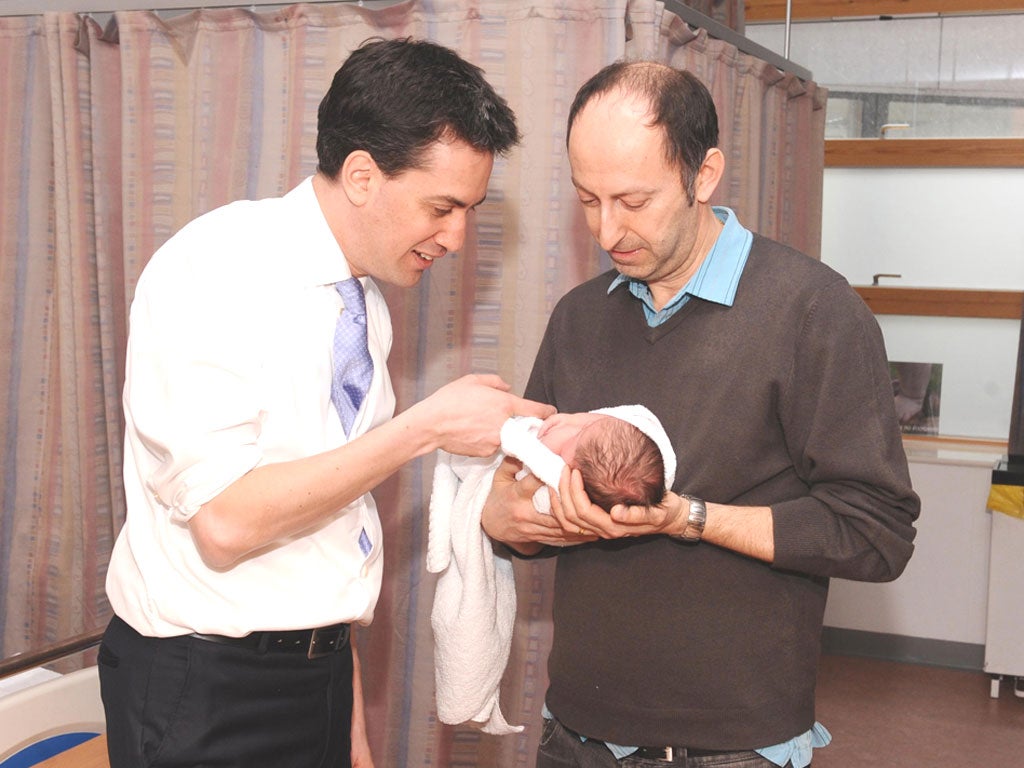 Ed Miliband meets Nicholas Vine and his daughter, Kimberley, at Princess Royal Hospital, Orpington, Kent