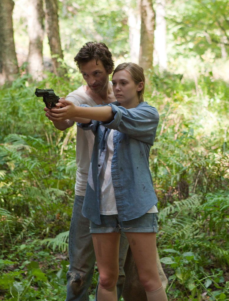 Trigger happy: John Hawkes and Elizabeth Olsen in 'Martha Marcy May Marlene'