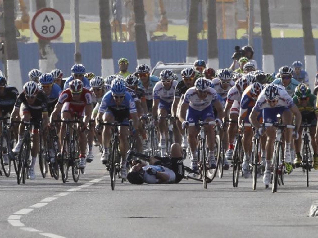 Mark Cavendish tumbles out on stage six yesterday