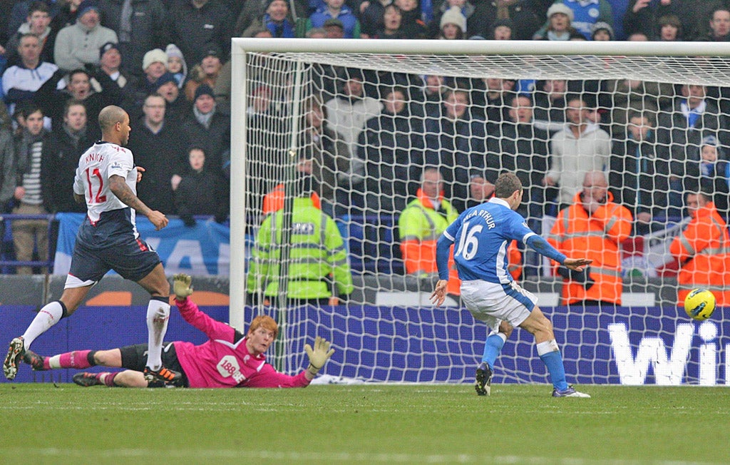 Home, James: Wigan Athletic’s James McArthur (right) scores their winner as the Bolton Wanderers goalkeeper Adam Bogdan is left stranded