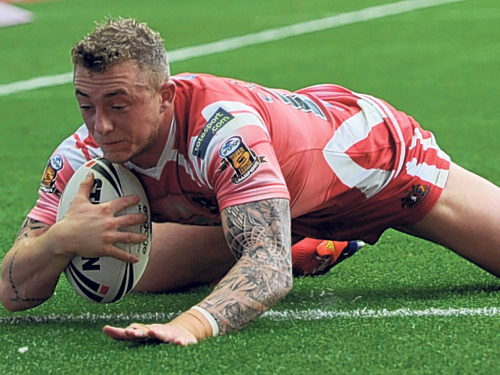 Treble shooter: Wigan Warriors match-winner Josh Charnley touches down