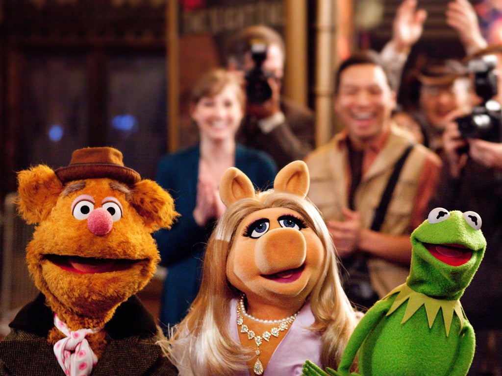 Puppet love: Fozzie Bear, Miss Piggy and Kermit