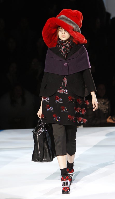 Marc Jacobs: The shoes looked Pilgrimesque, apart from the rhinestone buckle and flowers; the calf-length skirts and A-line wool coats matronly were it not for psychedelic print. The construction of each ensemble was a triumph of the imagination at Marc Jacobs. Contained within the collection – leather and lace, print and sparkle, cropped, long and oversized.
