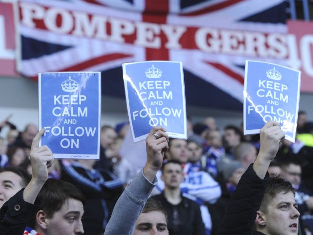 Rangers’ fans show their defiance at the club entering administration during the 1-0 defeat to Kilmarnock at Ibrox on Saturday