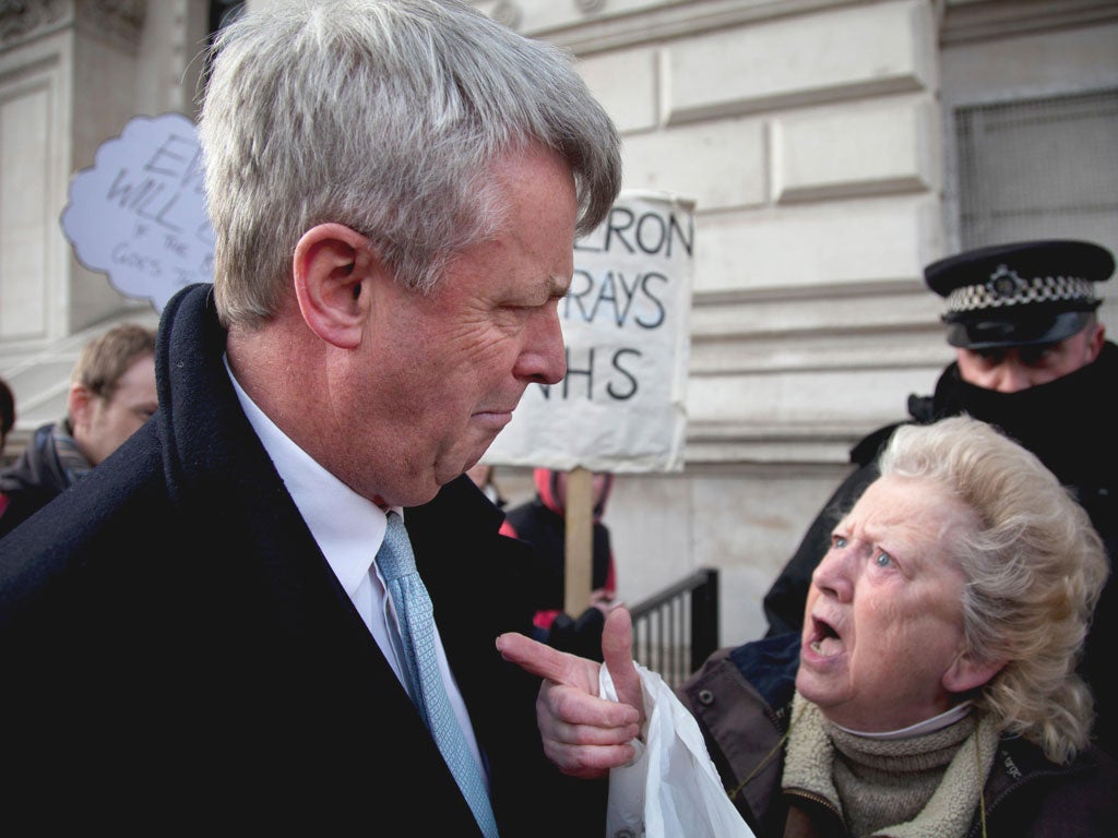 Andrew Lansley, the Health Secretary, was
confronted by protesters yesterday on his way
to a summit about his proposed reforms of the
health service. June Hautot, a veteran
campaigner, disputed his pledge not to introduce
charging