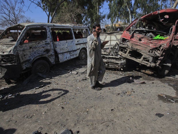 At least half a dozen minibuses were damaged by the blast