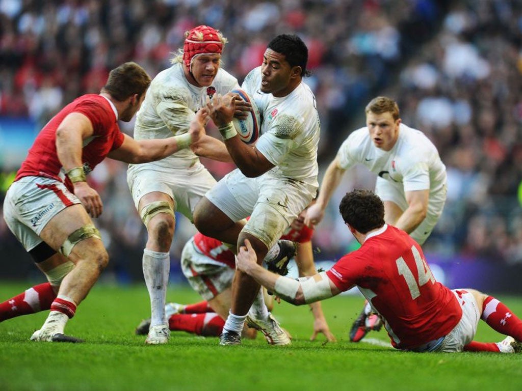 Manu Tuilagi takes on the Wales defence at Twickenham