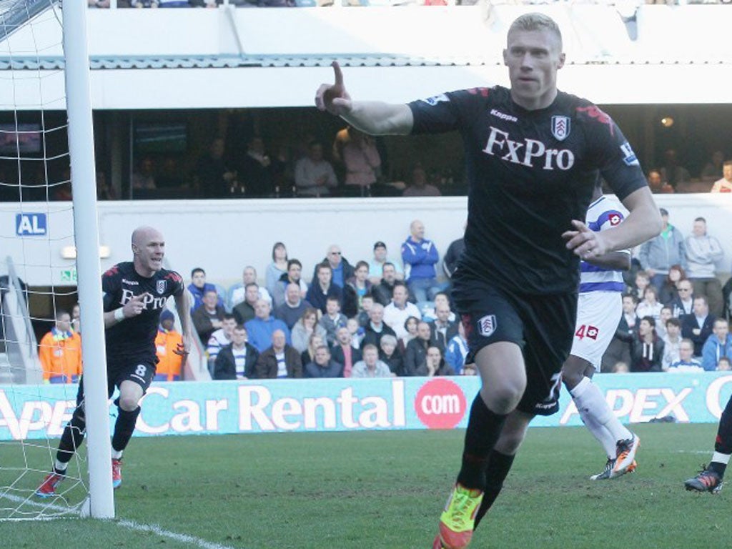 QPR's Pavel Pogrebnyak celebrates after his seventh-minute goal